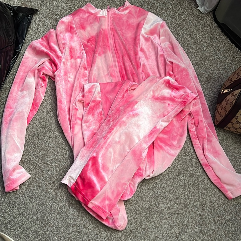 Pink jumpsuit.